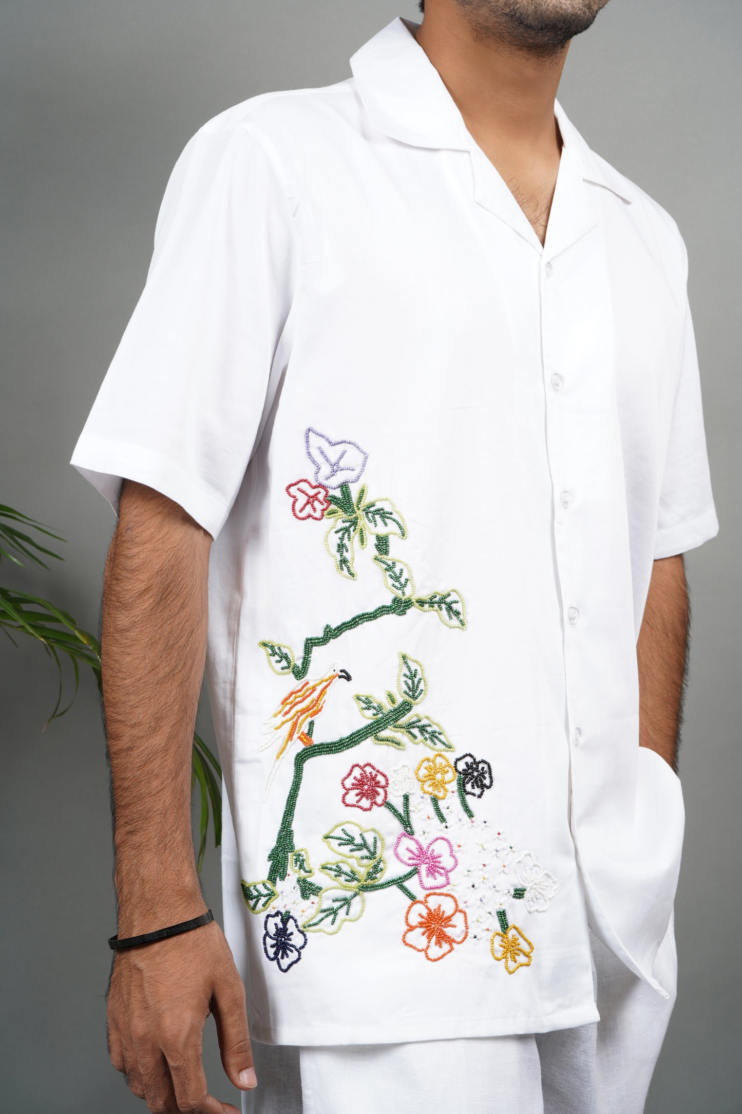 Handmade white cotton shirt with multicolor floral and bird hand embroidery, luxury artisanal shirt for men, unique embroidered summer wear.
