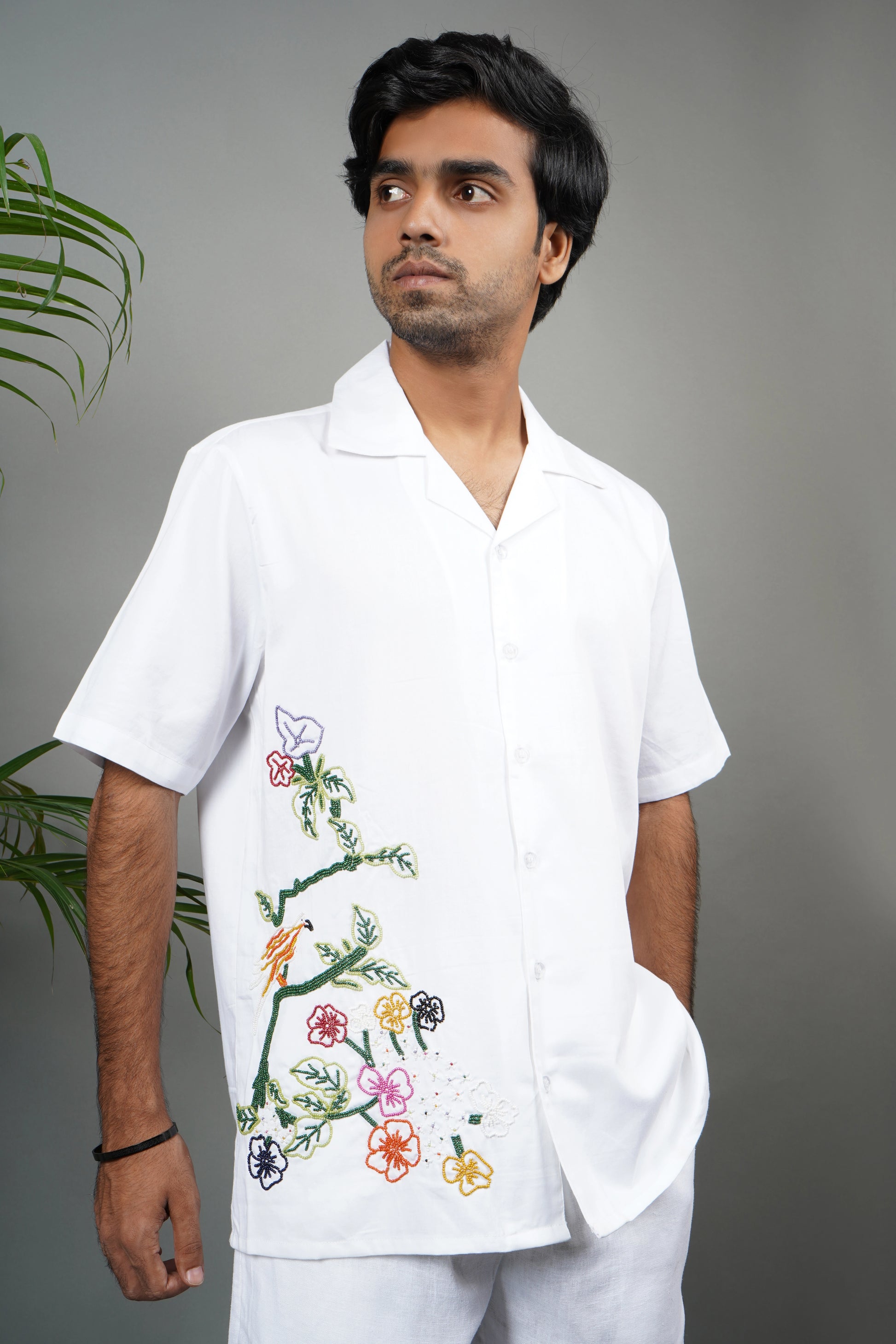 Handmade white cotton shirt with multicolor floral and bird hand embroidery, luxury artisanal shirt for men, unique embroidered summer wear.
