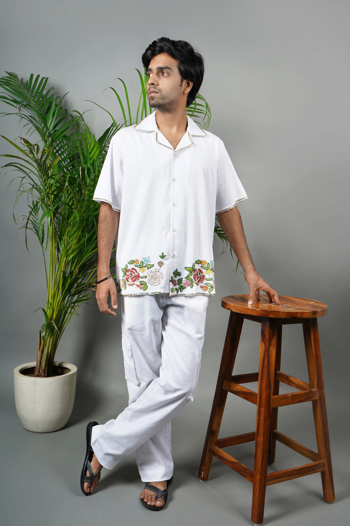 Men's premium white cotton shirt with intricate floral hand embroidery, breathable fabric, summer wear, luxury handmade fashion."