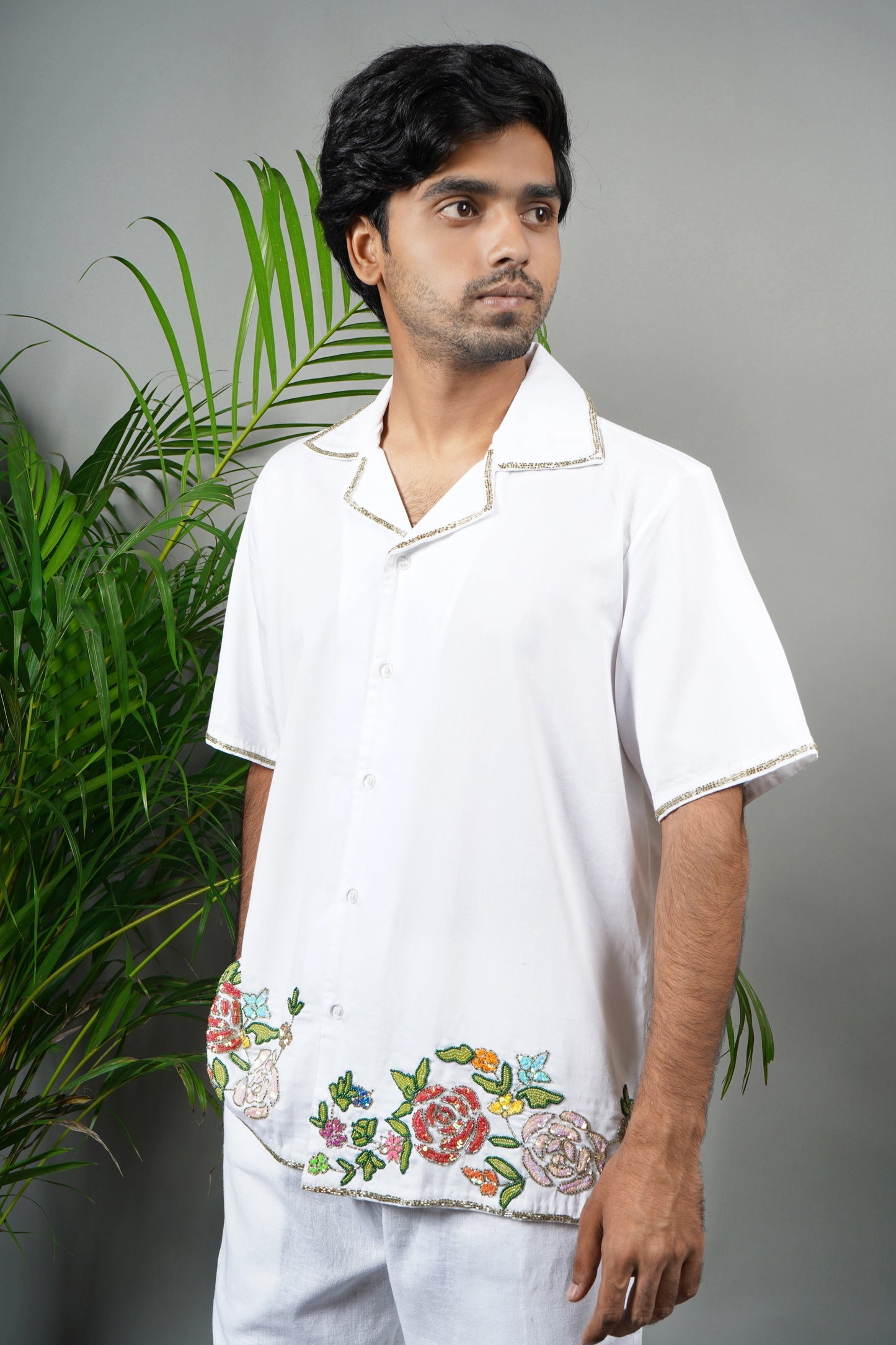 Men's premium white cotton shirt with intricate floral hand embroidery, breathable fabric, summer wear, luxury handmade fashion.