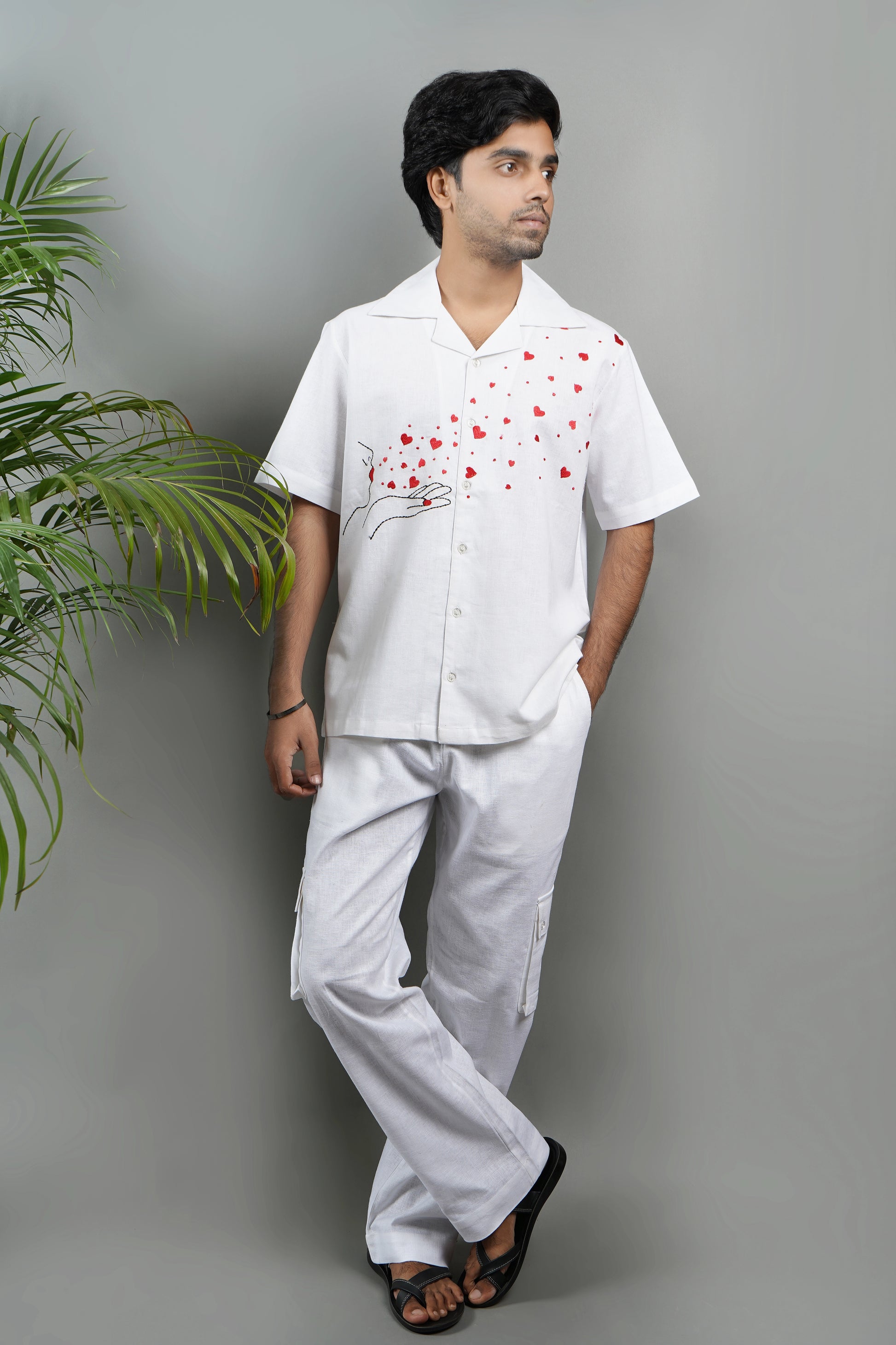 Handmade linen blend white shirt for men featuring red heart embroidery, artistic design, and luxury breathable material.