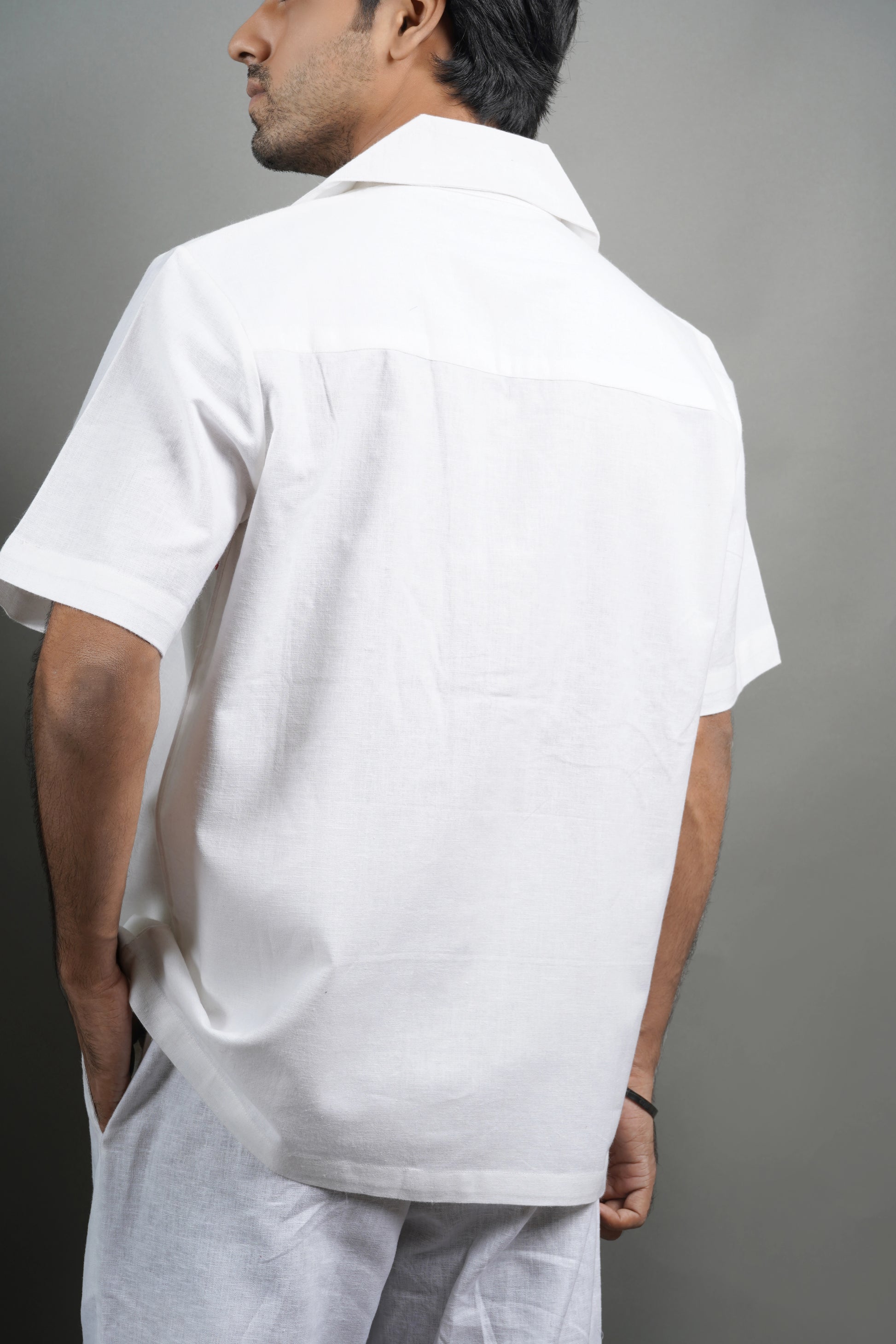 Handmade linen blend white shirt for men featuring red heart embroidery, artistic design, and luxury breathable material.