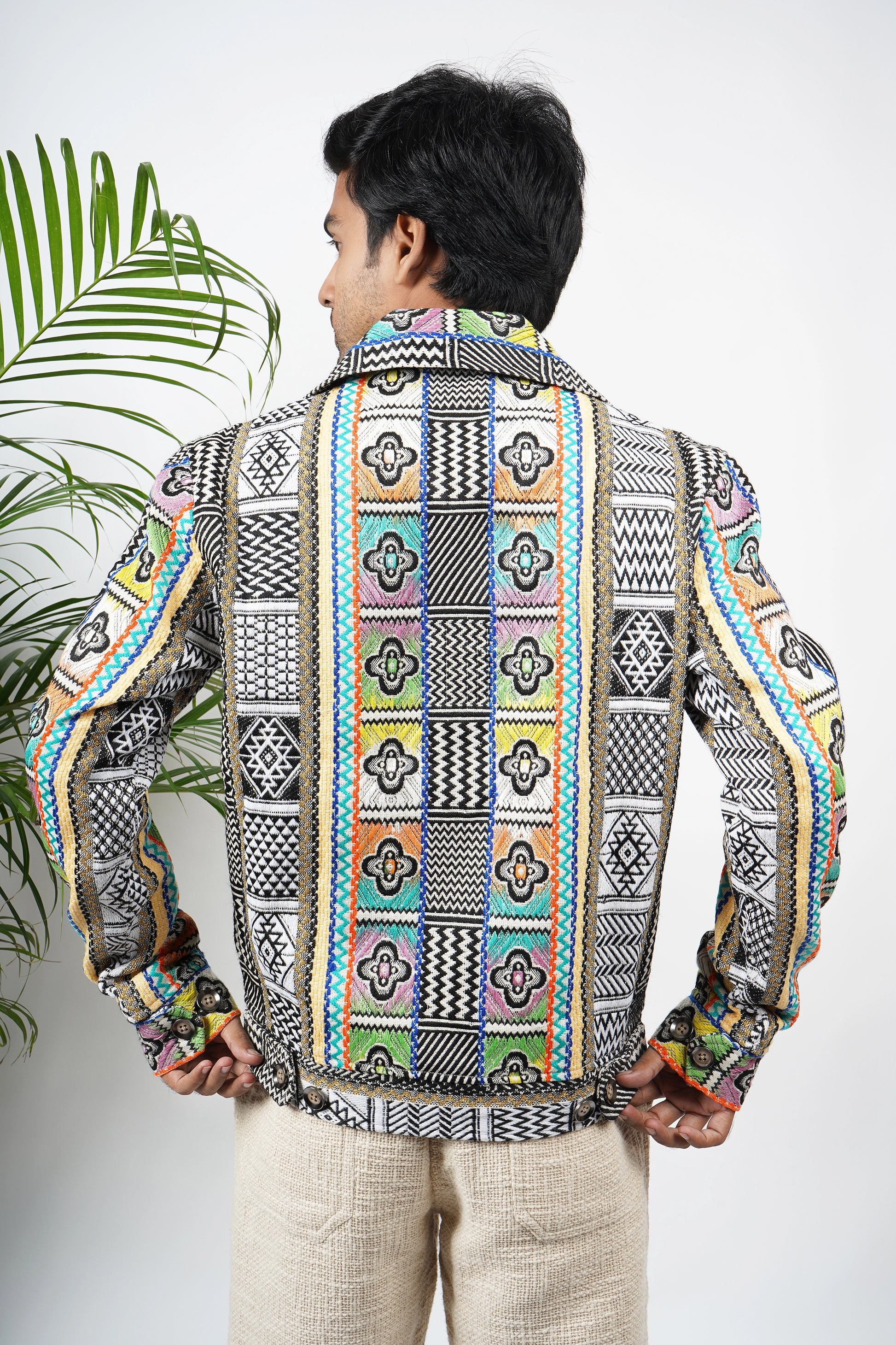 "Colorful handmade jacquard jacket for men with YKK zipper, intricate patterns, premium luxury fashion wear, winter collection.