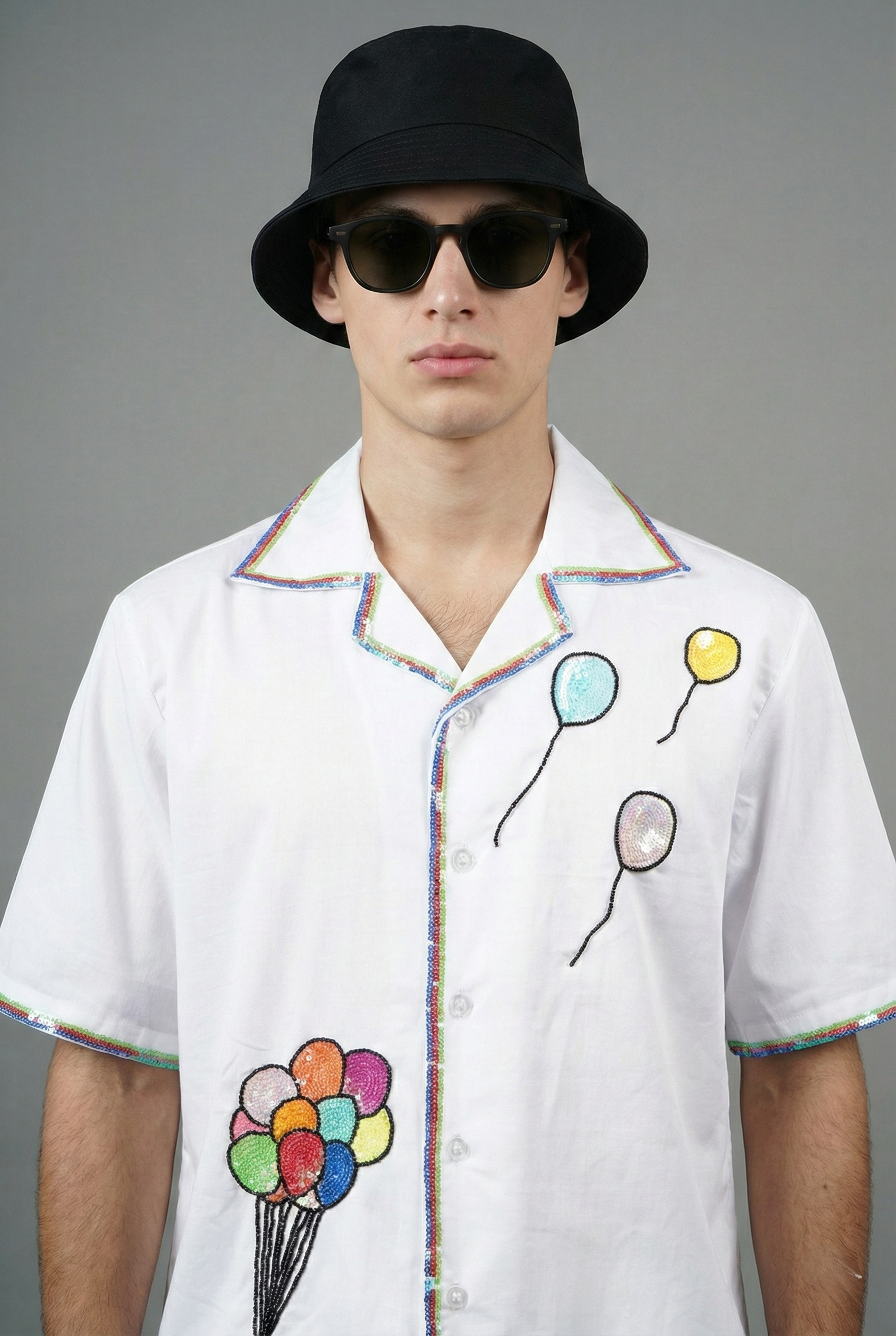 hand embroidered colorful balloon design on white cotton shirt artisan embroidery detail