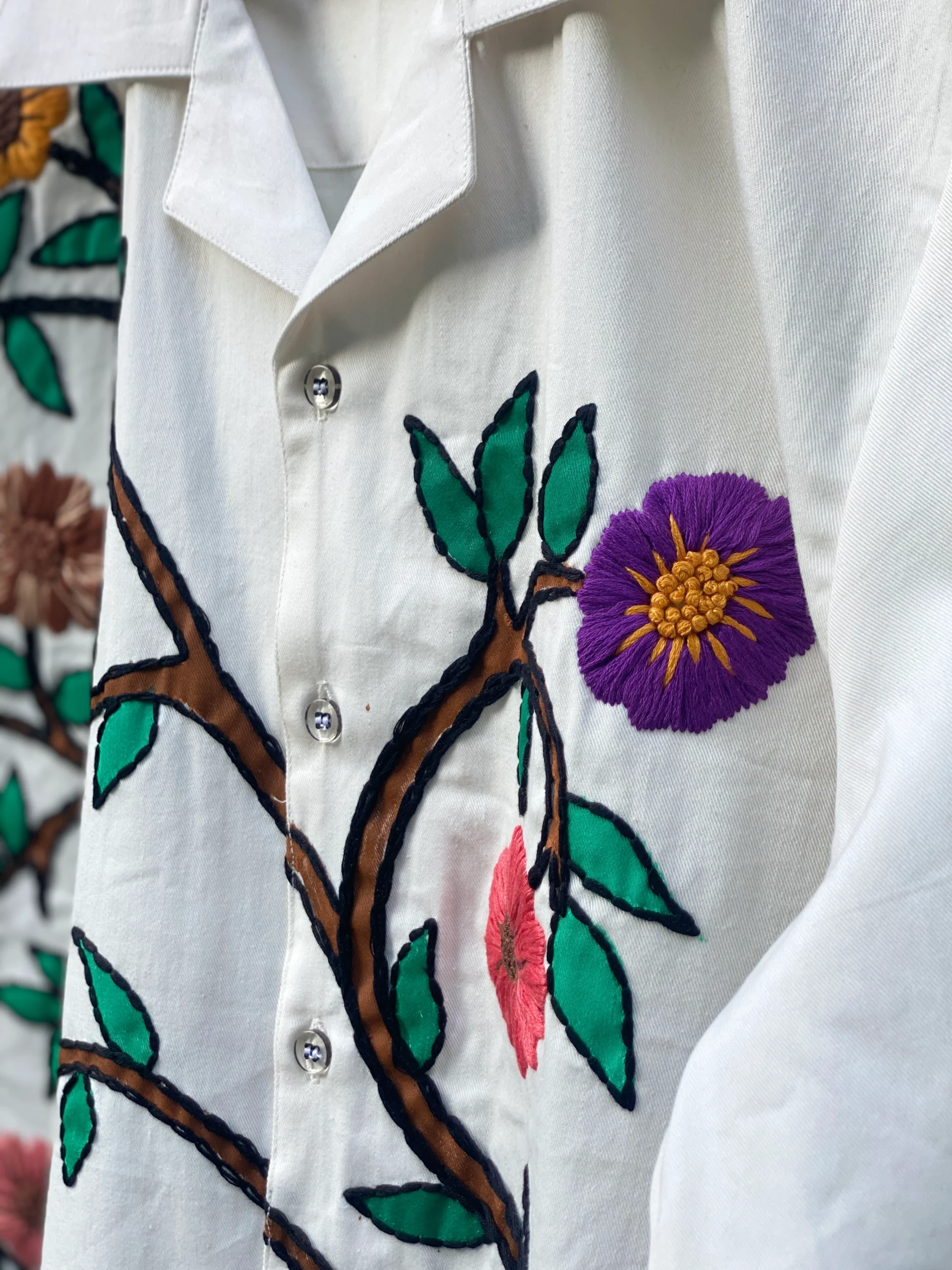 "Handmade cotton shirt with floral and tree design, crafted with hand embroidery, thread work, and fabric paint – limited edition Cuban collar shirt by Liibula"