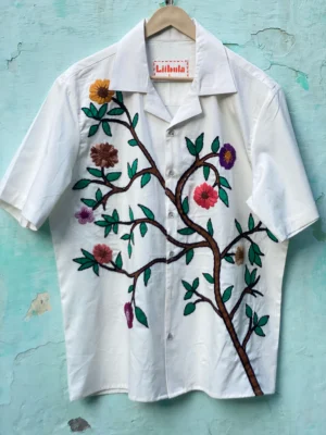 "Handmade cotton shirt with floral and tree design, crafted with hand embroidery, thread work, and fabric paint – limited edition Cuban collar shirt by Liibula"