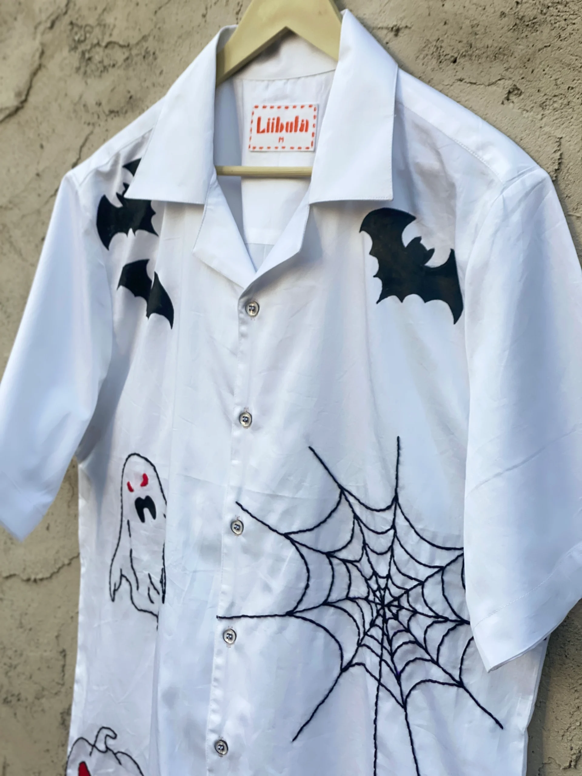 Embroidered spider web and spider design on handmade cotton shirt