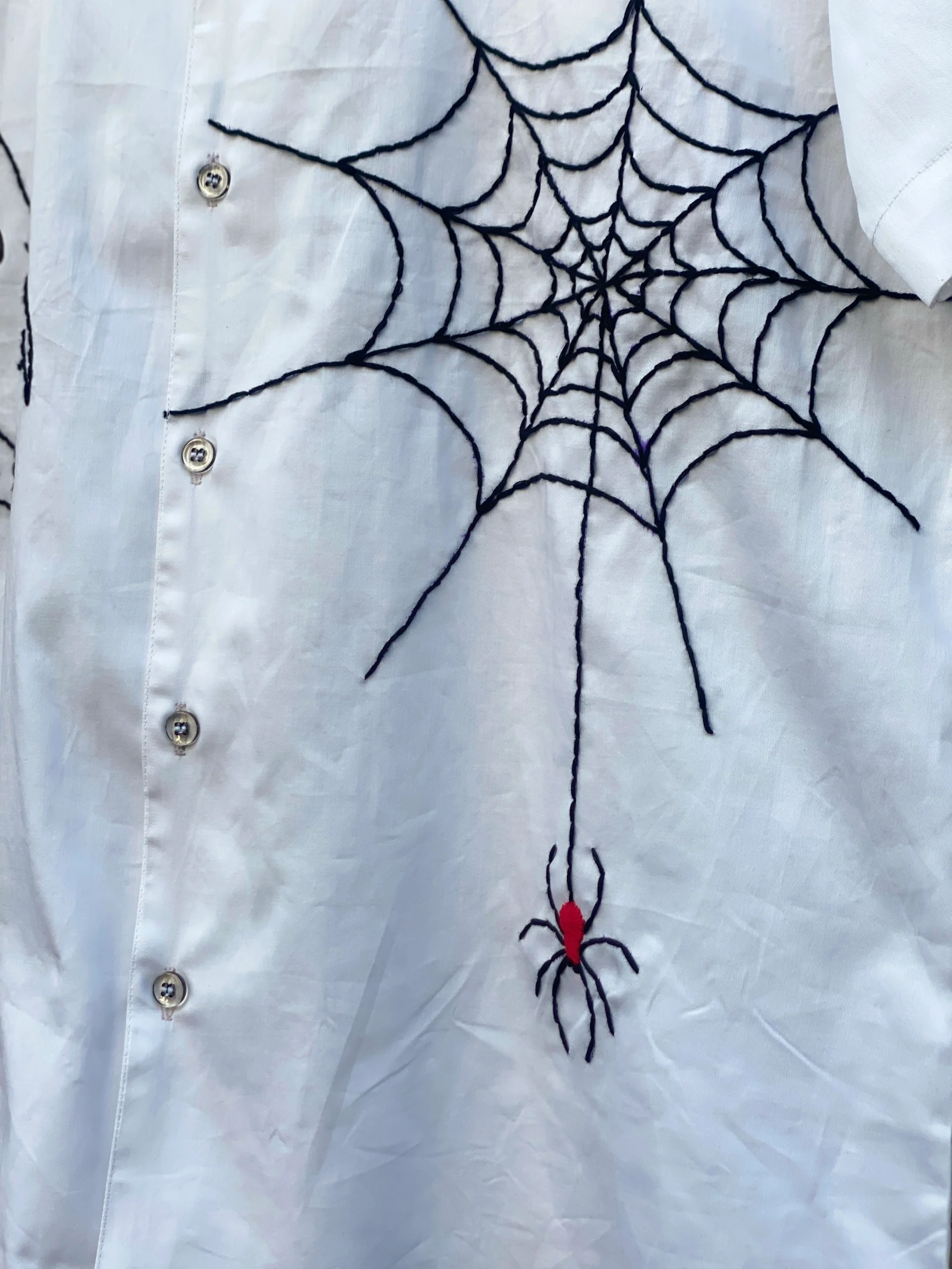 Unique artisan shirt with embroidered ghost and pumpkin face