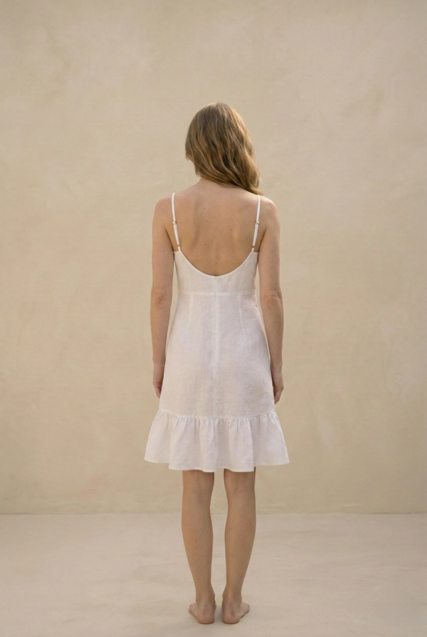 cottagecore linen dress minimal aesthetic back pose