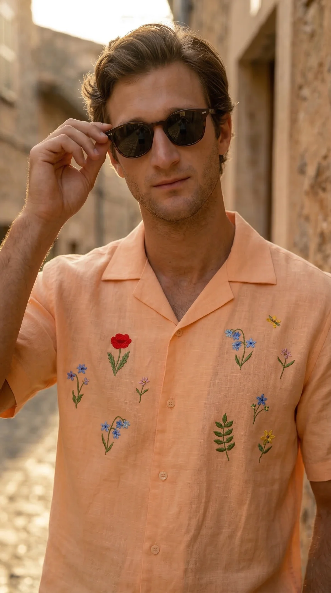 Mens floral embroidered linen Cuban collar shirt peach color summer outfit closeup