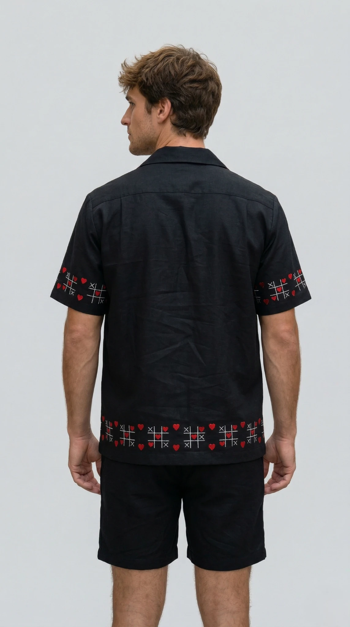 Back view of black embroidered Cuban collar shirt with red heart pattern, premium handmade mens cotton shirt resort wear