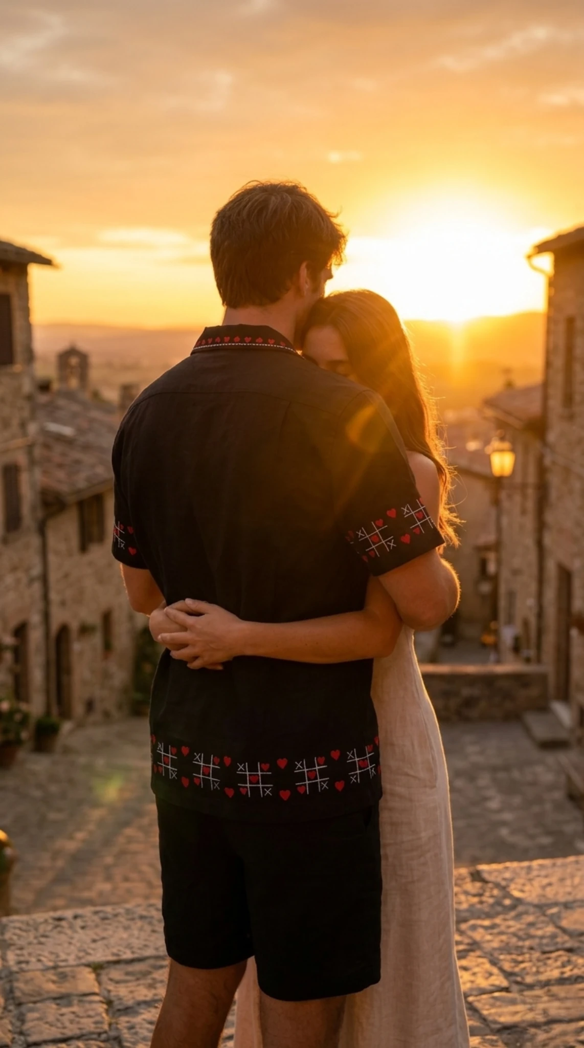 Back view of black embroidered Cuban collar shirt at sunset, romantic couple moment luxury handmade mens outfit
