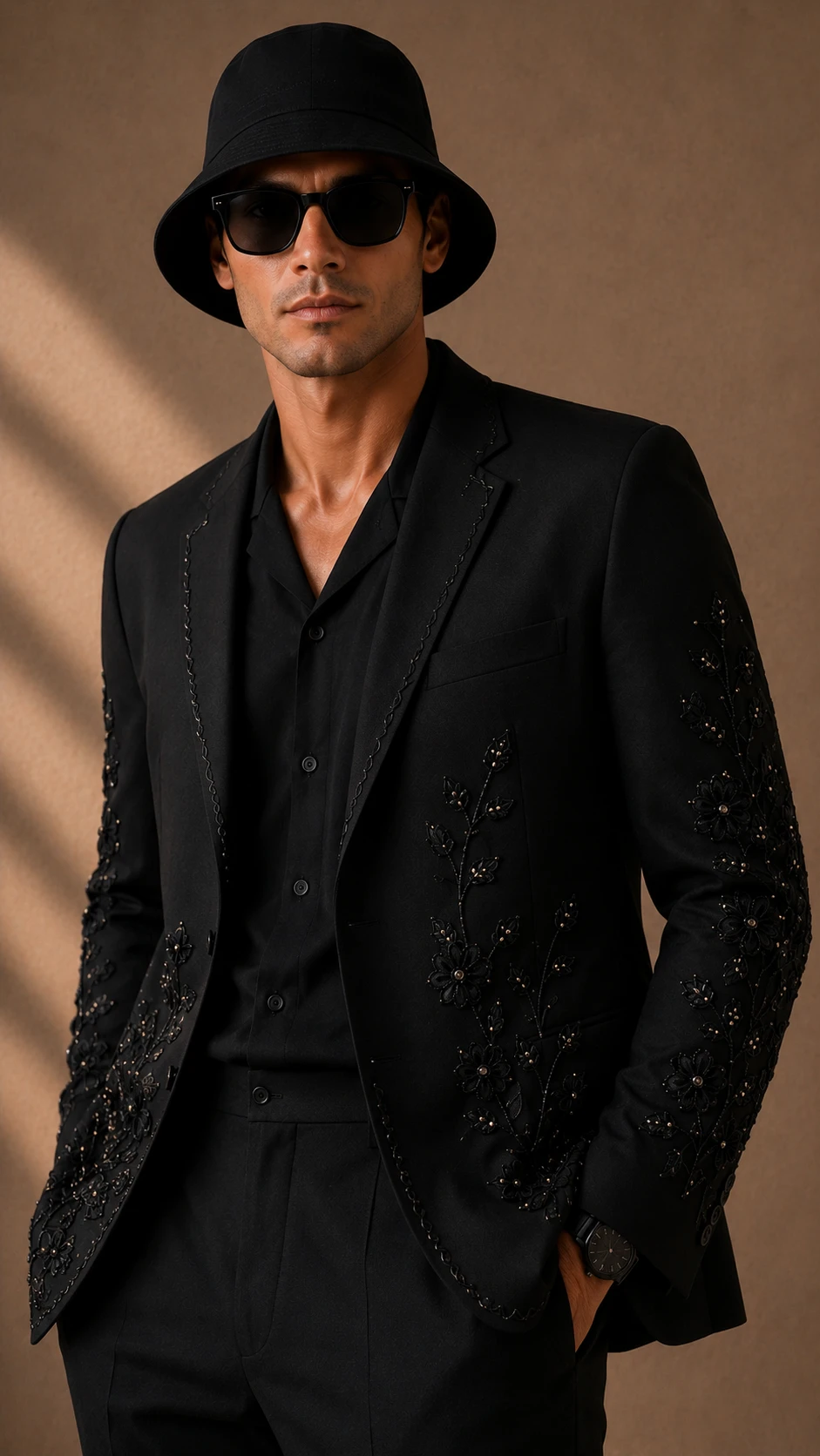Black embroidered men’s suit with handmade floral Cutdana embroidery