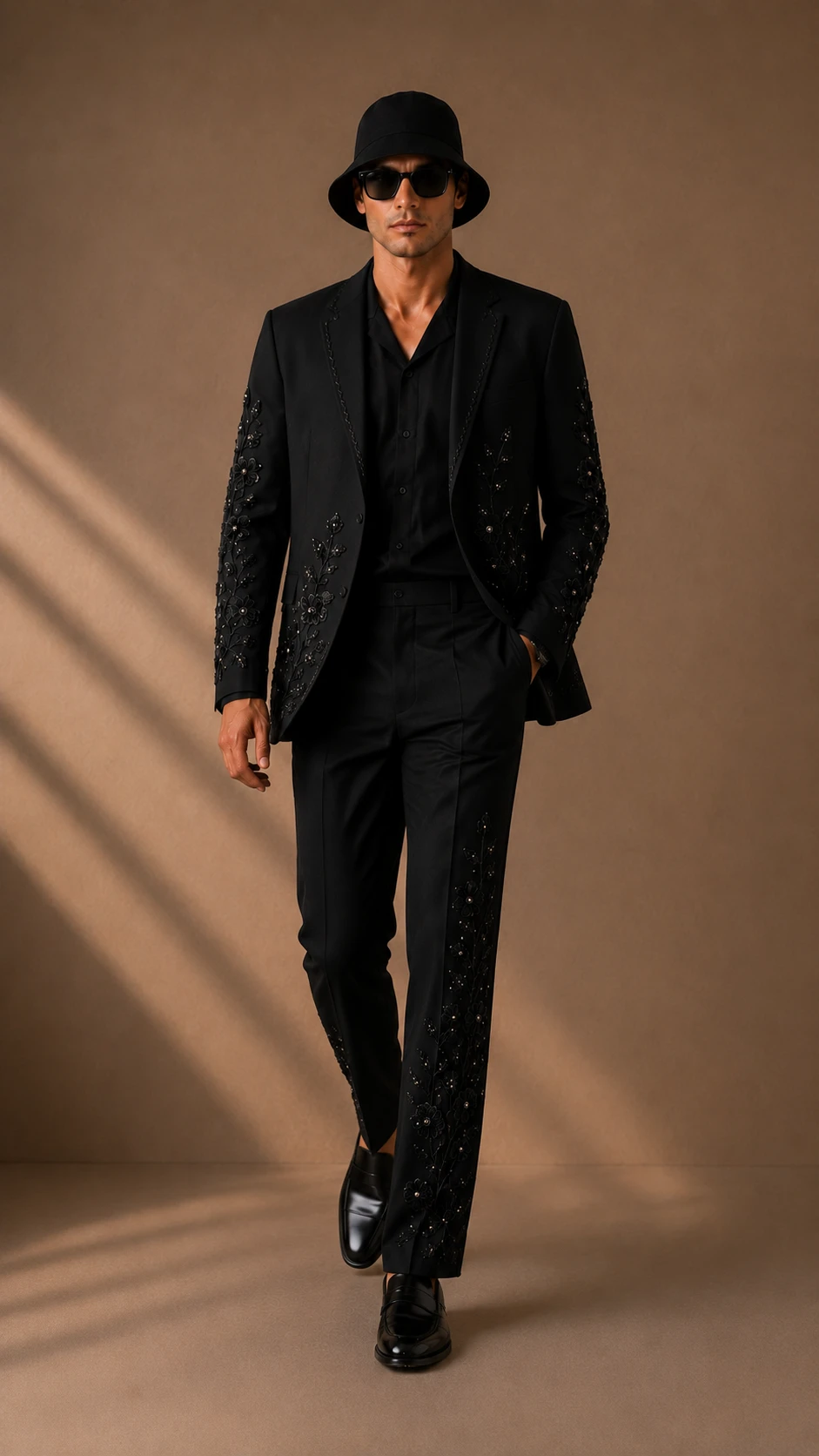 Black embroidered men’s suit with handmade floral Cutdana embroidery