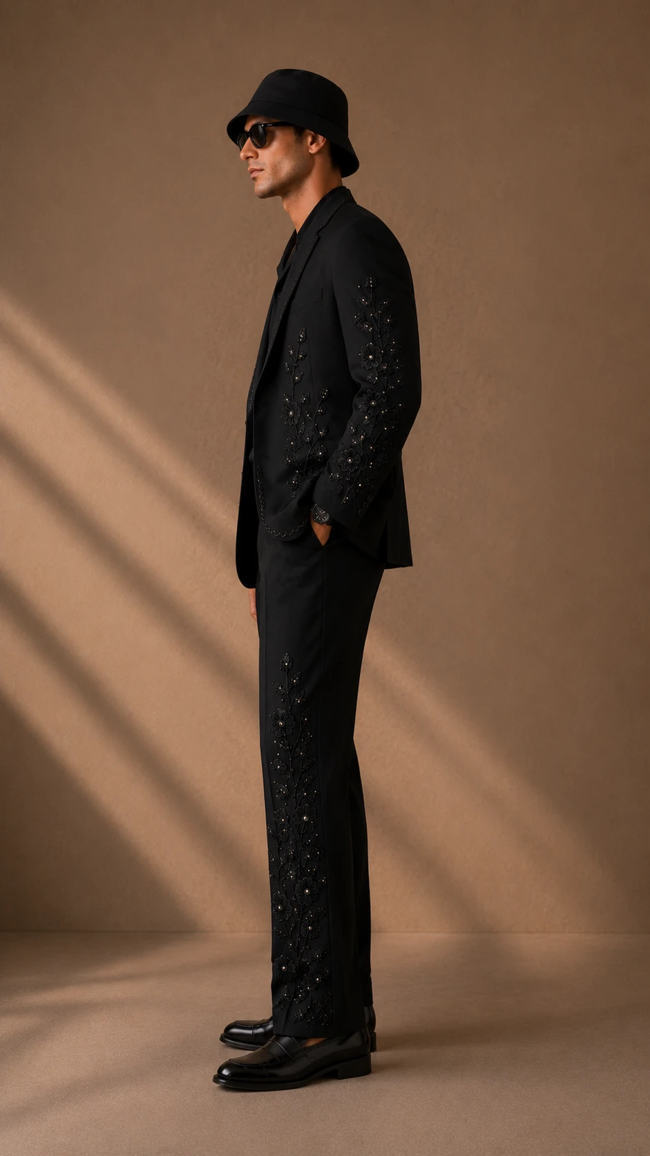 Black embroidered men’s suit with handmade floral Cutdana embroidery